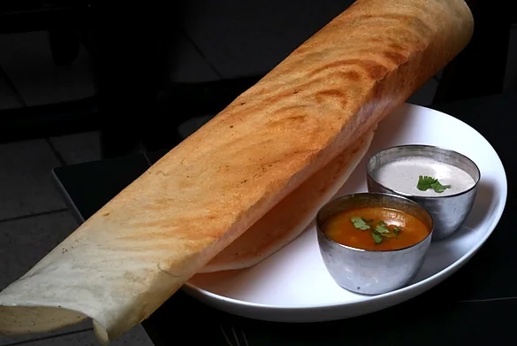 Crisp rolled dosa with sambar and coconut chutney